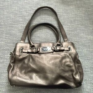 MICHAEL KORS - 17”w x 11”t double straps 
Bronze Leather w/silver tone hardware